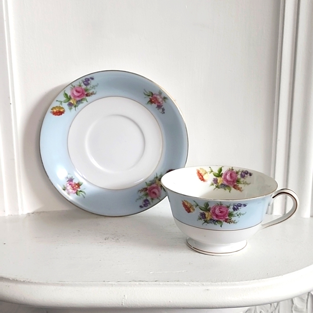 Vintage teacup and saucer by Noritake Japan blue white floral Gold Trim